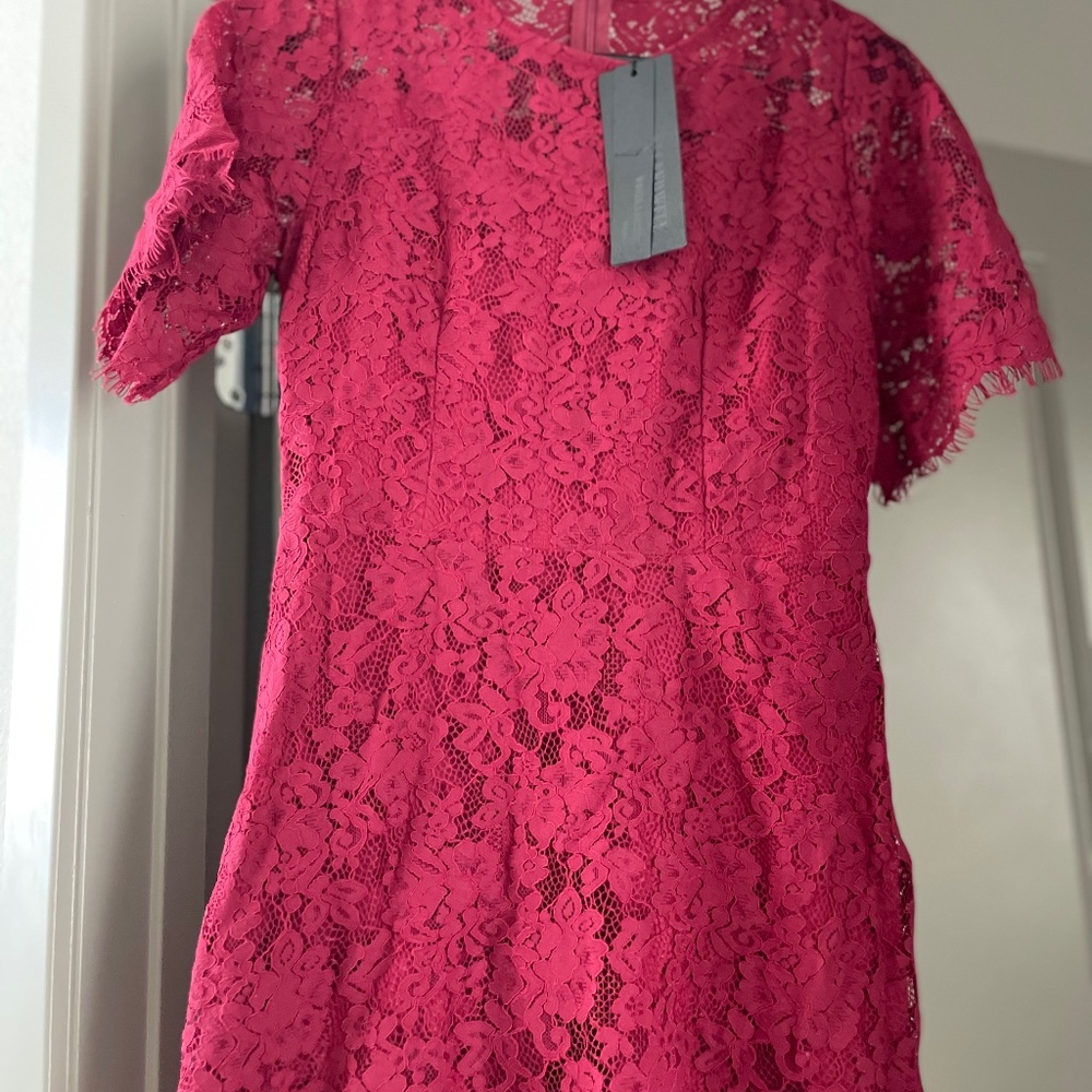 Super cute red lace dress, new with tags. Asking $25. Size M
